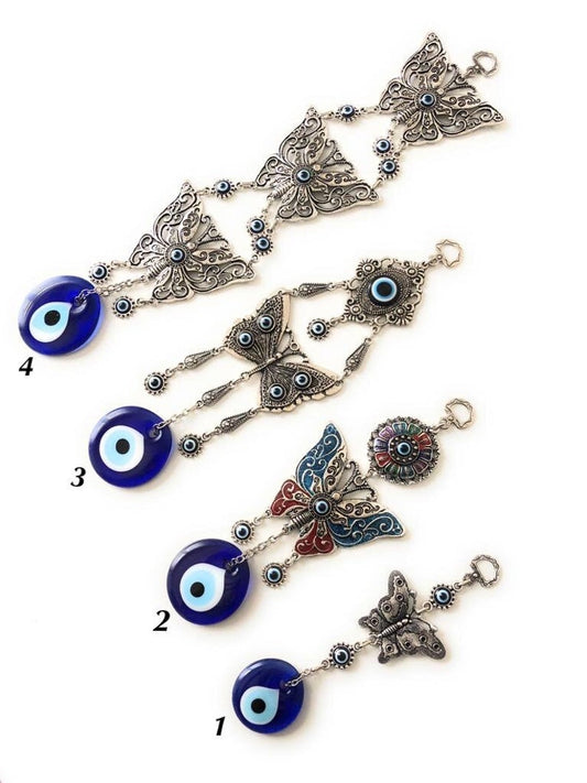 Butterfly wall hanging with evil eye beads