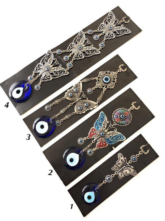Butterfly wall hanging with evil eye beads